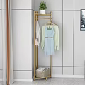 Gold Metal Clothes Rack With Hanging Clothes And Handbags Storage Basket In Modern Bedroom Interior