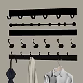 Decorative Wall Hooks With Various Designs For Hanging Coats And Bags On Beige Wall