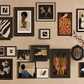 Gallery Wall With Diverse Framed Artworks Portraits Abstract Prints And Orchid Painting