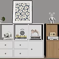 White and Light Wood Bookcase with Books Camera Clock Radio Decorative Items and Wall Art