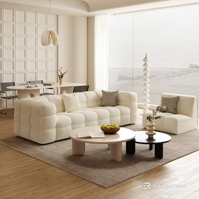 Modern Living And Dining Room With Plush White Sofa Round Coffee Table And Dining Chairs 3d model 