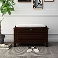 Wooden Storage Bench With White Cushion Green Plant Slippers And Magazines In Indoor Space