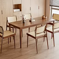 Wooden Dining Table Set With Six Beige Cushioned Chairs And Decorative Items In Bright Room
