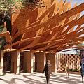 Wooden Architectural Canopy Structure With Overlapping Slats And Natural Lighting 3d model