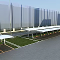 White Tensile Membrane Carports in Neatly Arranged Parking Lot with Green Lawn and Background Buildings