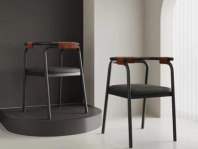 Modern Single Chairs With Black Frame Brown Armrests And Black Seat Cushion In Indoor Setting 3d model