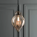 Elegant Glass Pendant Light With Lantern Design Illuminated Against Gray Paneled Wall