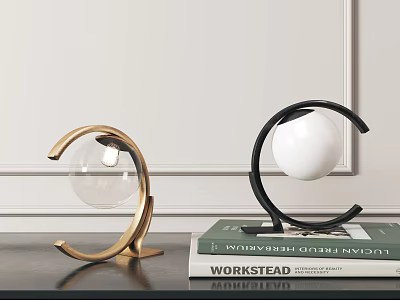 Modern Table Lamps with Gold Black Arc Metal Frames and Glass Globe Shades on Books 3d model