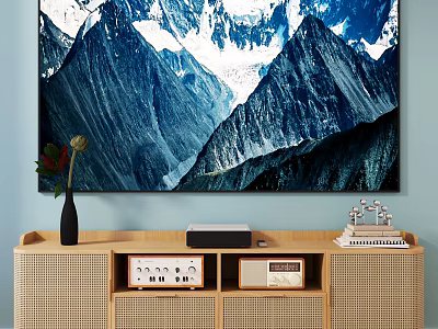 Wooden TV Stand with Wicker Doors Black Vase Flowers Electronics Books Decor Against Mountain Painting 3d model