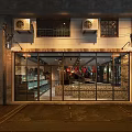 Modern Industrial Restaurant Facade With Glass Doors Exposed Concrete And Exterior Lighting