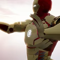 Iron Man Game Movie Character With Gold Red Armor And Glowing Palm Energy Ball