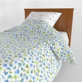 Single Bed with Wooden Frame and Floral Pattern Bedspread and White Pillow 3d model