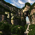 Stunning Natural Tianmen Mountain Landscape With Giant Rock Arch And Long Stone Stairway Under Blue Sky