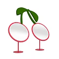 Stylish Round Mirrors With Red Frames And Red Stands Featuring Green Leaf Decorations