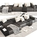 Plush Black Leather Sectional Sofa With Soft Pillows Side Tables And Cozy Living Room Setup