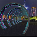 Glowing Arched Activity Passage With LED Lights And Urban Night City Skyline View