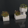 Stone Planters With Layered And Square Designs Featuring Red And Purple Flowers