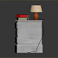 Colorful Drawer Nightstand With Table Lamp Stack Of Books And Alarm Clock