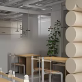 Modern Café Interior With Open Layout Tables Chairs Pendant Lights And Green Plants