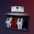 Retail Display Shelf with Digital Screen Showing Visual Merchandising and Hanging Colorful Printed T-shirts