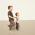 Two Young Boys Standing With Arms Outstretched Against Light Colored Background And Carpeted Floor