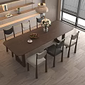 Modern Wooden Dining Table Set With Mixed Color Chairs And Flower Vase On Wooden Floor Interior