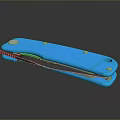 Modern Blue Folding Knife With Textured Handle And Metal Components On Reflective Surface