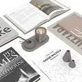 Stylish Books and Magazines Display With Open Pages Coffee Cup and Decorative Objects
