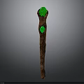 Detailed Carved Brown Wooden Staff With Two Green Gemstones On Top And Middle