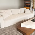 Elegant White Fabric Sofa With Cushions And Marble Top Wooden Coffee Table Set