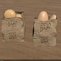 Fresh Bread and Coffee Beans in Brown Paper Bags on Wooden Table