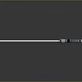 Long White Rod Tool With Black And Silver Striped End Design