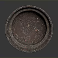 Intricately Carved Metallic Bowl With Detailed Patterns And Smooth Surface Design