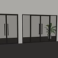 Modern Sliding Glass Doors with Black Frames in Interior and Potted Plant