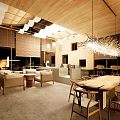Modern Restaurant Interior With Wooden Ceiling Chandelier Open Layout Dining Table And Bar Counter