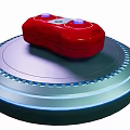 Stylish Entertainment Electronics Red Game Controller on Circular Base with Blue Light