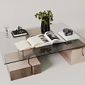 Modern Coffee Table With Glass Top Open Book Green Plant Camera And Stationery