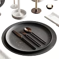 Elegant Modern Dinnerware Set with Black Plates Silver Cutlery Wine Glasses Candle Holders and Placemats