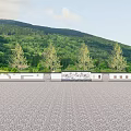 Scenic Wall with Mountain Green Vegetation and Trees in Background on Gray Paved Ground