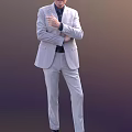 A Man In Light Gray Suit With Arms Crossed Pointing With Index Finger