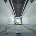 Person in Protective Suit in Long White Corridor With Side Equipment End Window and Green Trees