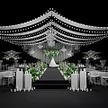 Wedding Banquet Hall With Decorative Lights Chandeliers Greenery Aisle And White Chairs