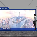 Futuristic Indoor Corridor Design With Blue White Curved Lines Person Standing Digital Screens Bright Lighting