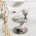 Modern Side Table With Glass Top Spiral Base And Pencils Magazines