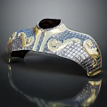 Ornate Metallic Decorative Object With Golden Scroll Patterns And Checkerboard Texture