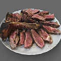 Sliced Grilled Steak With Juicy Tender Meat And Charred Edges On White Plate