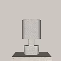 Beige Fabric Lampshade Table Lamp With White Cylindrical Base On Light Table And Beige Wall 3d model