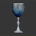 Elegant Blue Glass Goblet With Silver Floral Patterns And White Base