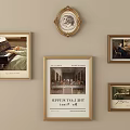 Various Decorative Photo Frames Hanging On Beige Wall With Art Prints 3d model