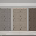 Three Colored Wooden Lockers With Alphabet Labeled Compartments Neatly Arranged On White Wall Light Floor